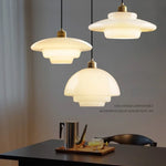 lampe suspendue minimaliste verre blanc opaque métal doré salon chambre