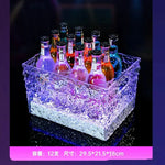 bac bouteilles transparent moderne poignées bouteilles multicolores motifs géométriques élégant reflets multicolores