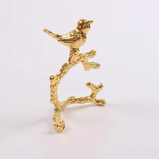 porte serviette moderne or oiseau stylisé argent branche naturelle minimaliste