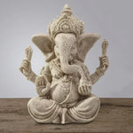 statue ganesha décorative asiatique résine sculptée beige clair blanc cassé fleurs roses plantes vertes
