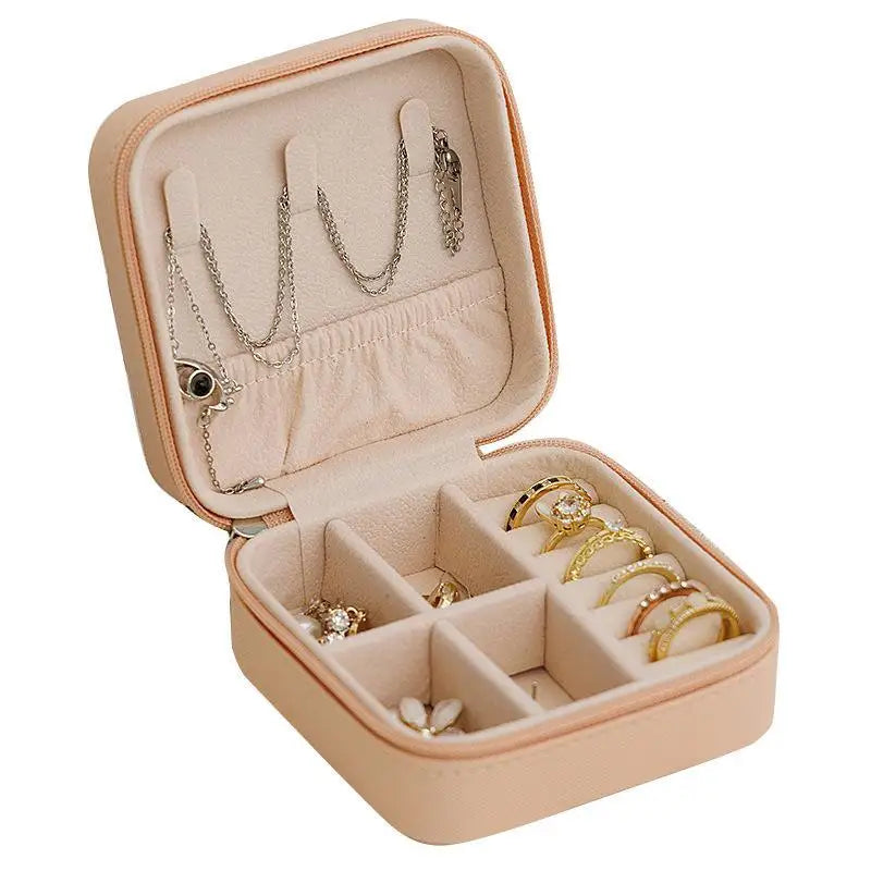 boîte bijoux simili cuir zippée compartiments moderne vert rose beige noir