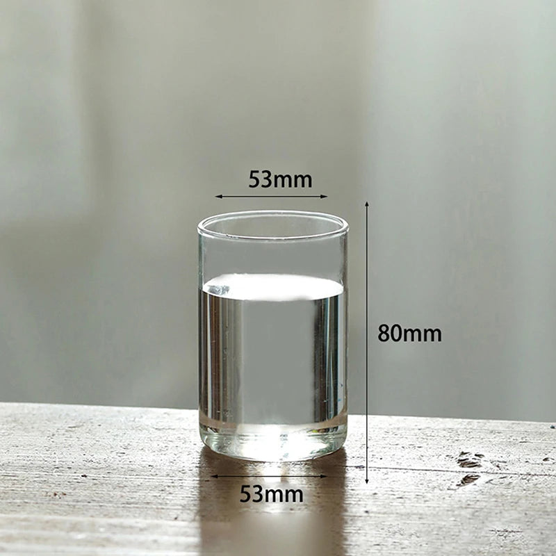 vase verre transparent moderne base bois fleurs artificielles inclusion chambre