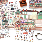 puzzle multicolore art deco détails bâtiments adhésif pièces boite rangement lunettes