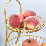 Détail de la structure en fer de la corbeille à fruits double couche