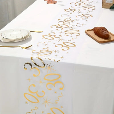 Chemin de table anniversaire doré 30 ans sur table rectangulaire décorée