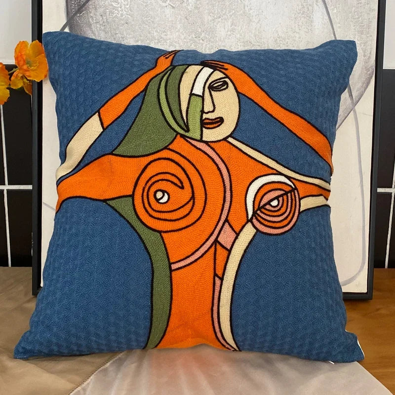 housse coussin coton brodé motifs abstraits visages stylisés moderne pop art bleu blanc orange