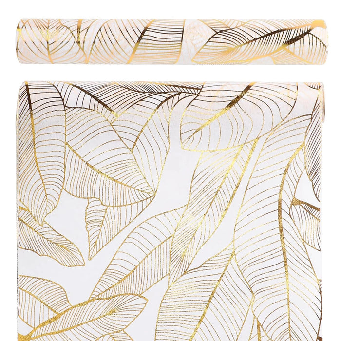 nappe moderne élégante feuilles dorées blanc décoration table serviettes assiettes verres