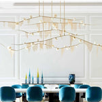 suspension lumineuse moderne dorées franges opalescentes élégante led lumières 180cm doré blanc