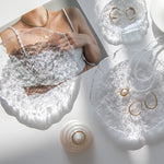 plateau rangement bijoux transparent moderne texture granulée fixations doré minimaliste