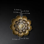 supports encens forme lotus or bronze floral texturé zen oriental décoration aromathérapie maison salon