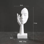 statuettes décoratives visage humain noir blanc doré modernes minimalistes abstraites contemporaines base carrée livres
