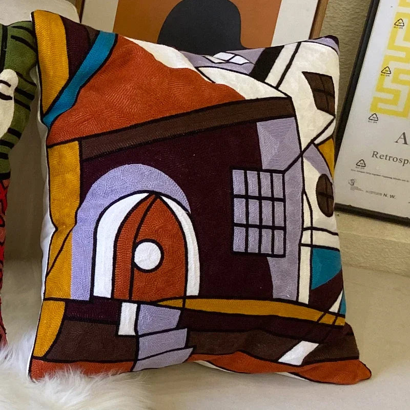 housse coussin coton brodé motifs abstraits visages stylisés moderne pop art bleu blanc orange