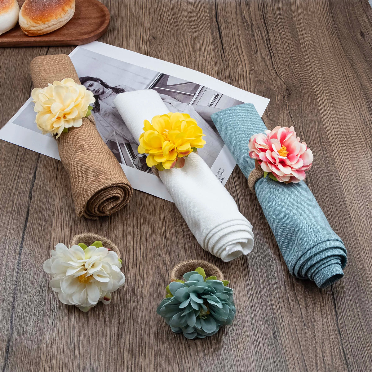 serviettes pliées fleurs artificielles ruban beige blanc rose décoratives table événement
