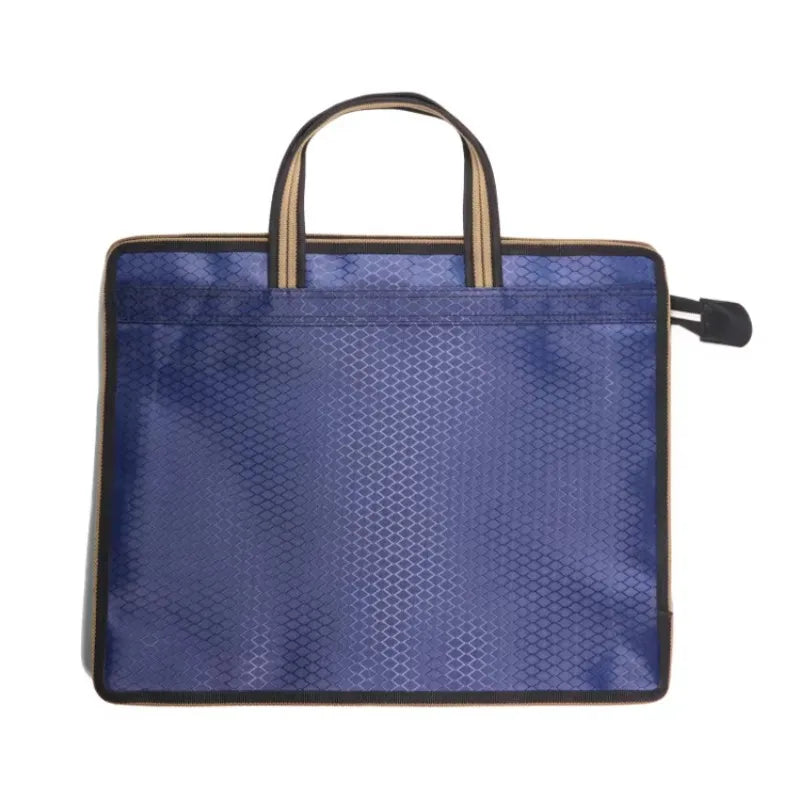 sac main moderne bleu géométrique poignées métalliques carnet stylo papier ruban