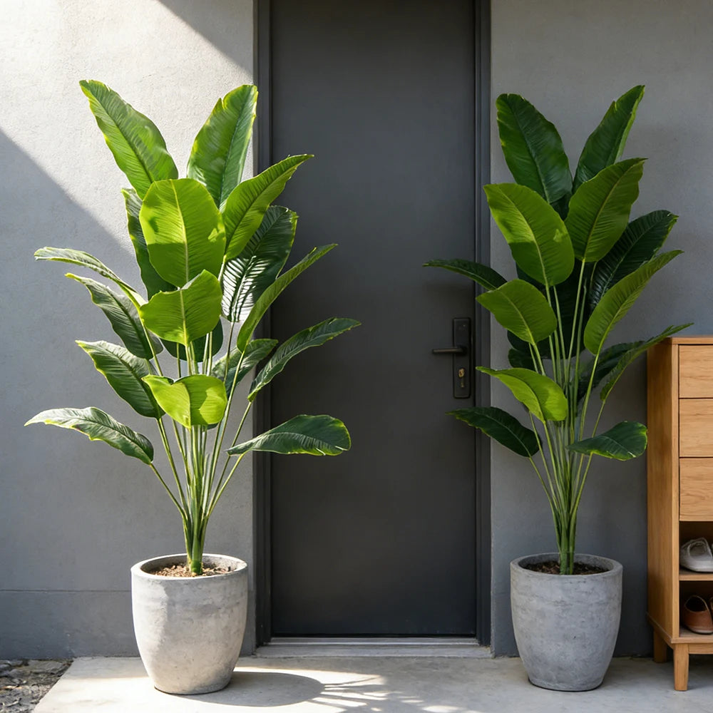 plante artificielle vert feuilles larges moderne pot céramique grise panier osierintérieur décoration maison