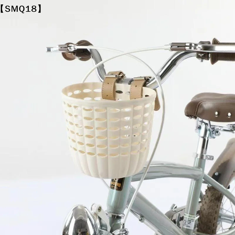 panier vélo rose clair noir perforé cercles moderne pratique cuir boucle