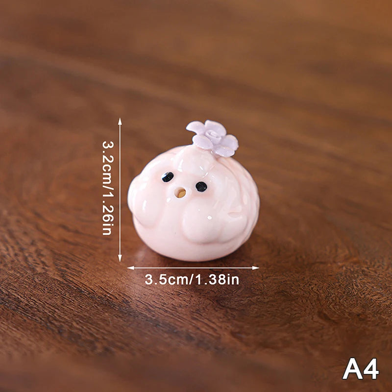 bol thé décoratif motifs fleurs pois rose blanc figurines porc céramique artisanal