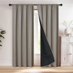 Rideaux thermique gris avec un passage de tringle, solution élégante pour le traitement des fenêtres, apportant une touche sophistiquée à l'intérieur de la maison.