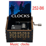 boîte musicale bois naturel motifs floraux 18 tons vintage manivelle horlogerie artisanale