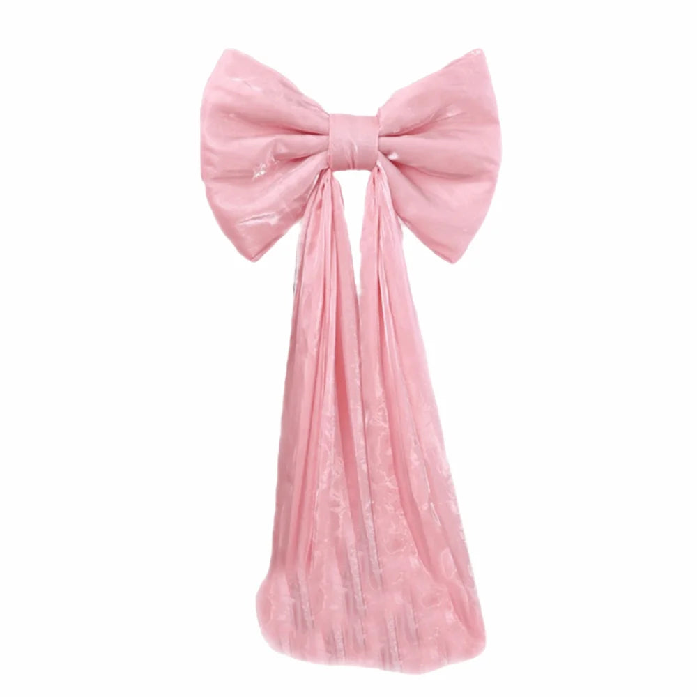 ruban decoratif forme noeud sequins dorés argentés rose rouge nouvelle année fête grande dimension