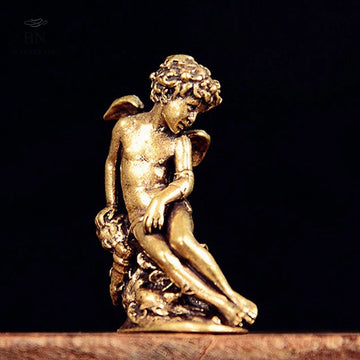 statue ange enfant dorée ailes base végétale renaissance ornement décoration intérieur classique erotique miniature