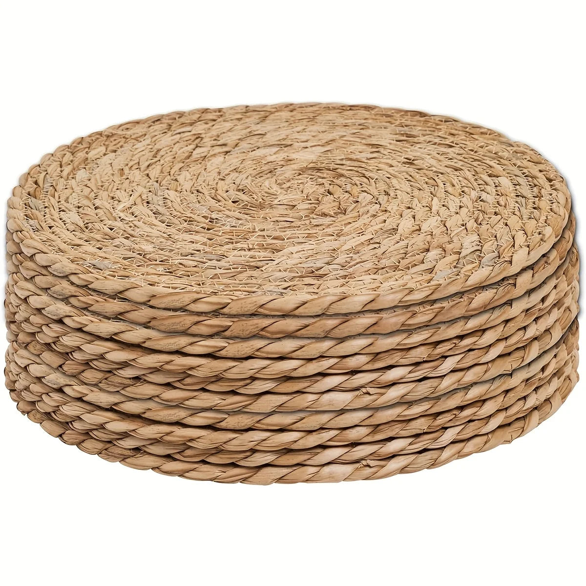 assiettes rustiques tissées spirales naturelles serviette blanche guirlande feuilles conques dorées decoration cuisine festive
