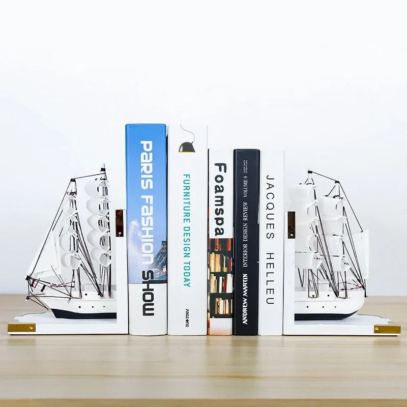 support livres bateau voiles transparentes clips dorés moderne décoratif noir blanc
