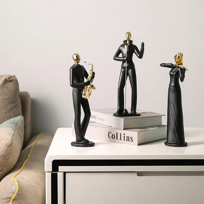 statue musicien moderne abstraite saxophone guitare noire décoration intérieure couple instrumental résine opaque base