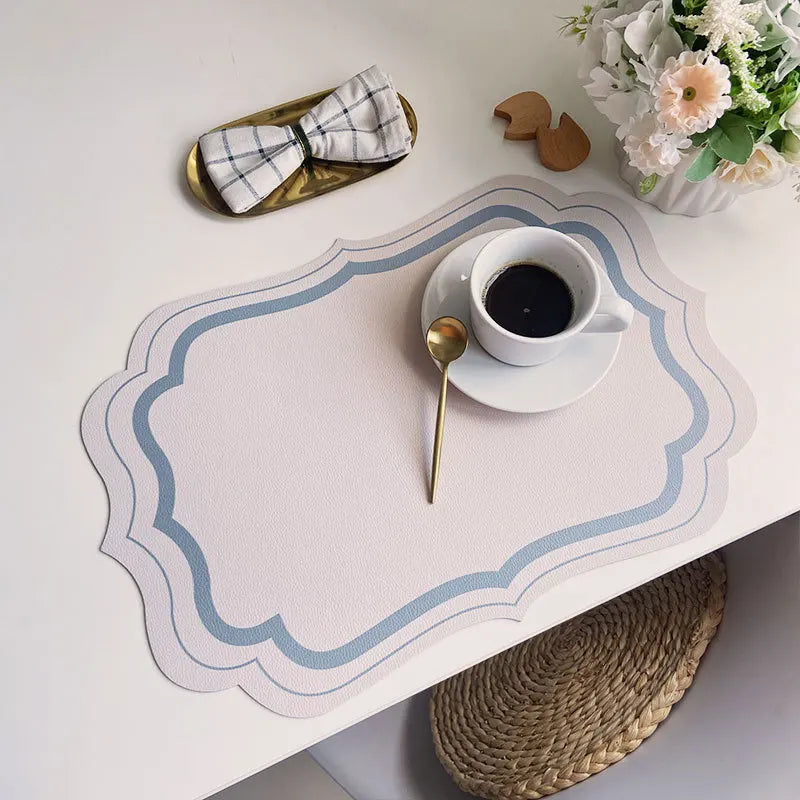serviettes table moderne motif géométrique rose clair vert bleu beige ornementées
