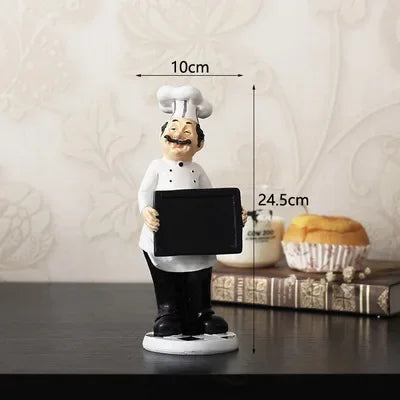 statue cuisinier résine détails sculptés assiette dessert gobelet bouteille sauce plateau pain blanc gris