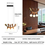 Suspension lumineuse contemporaine bois marron clair doré noir trois ampoules blanches salon restaurant chambre