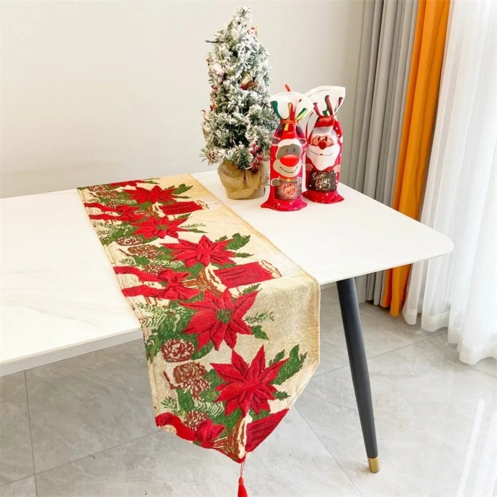 table table noël fleurs poinsettia feuilles vertes bordure dorée classique festif blanc rouge vert