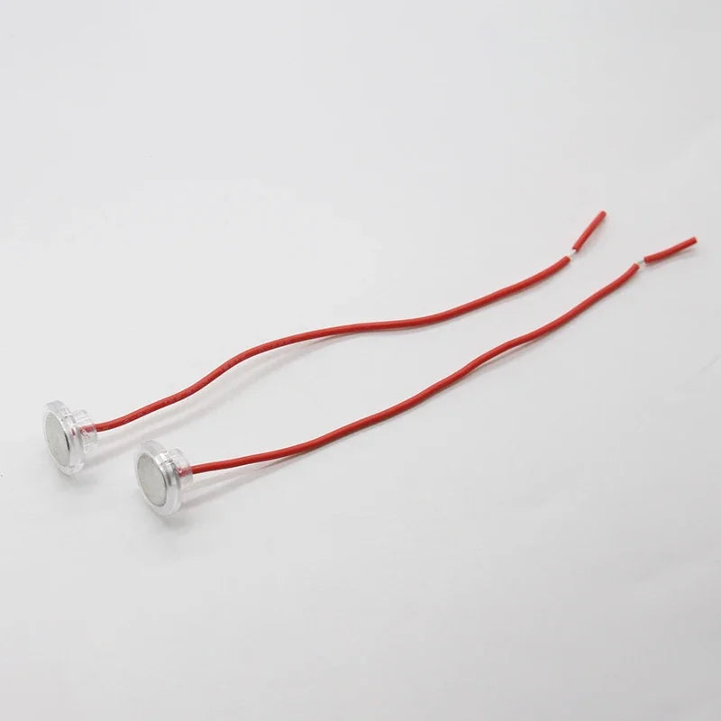 interrupteur tactile rouge fil argenté technique industriel transparent sans lampe