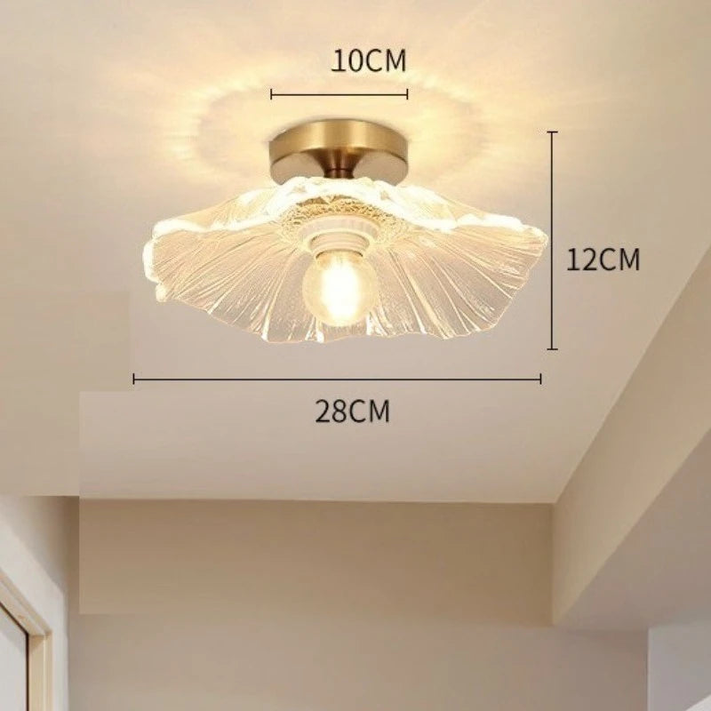 lampe suspendue or transparente motif floral texture ondulée moderne élégante tringle câble