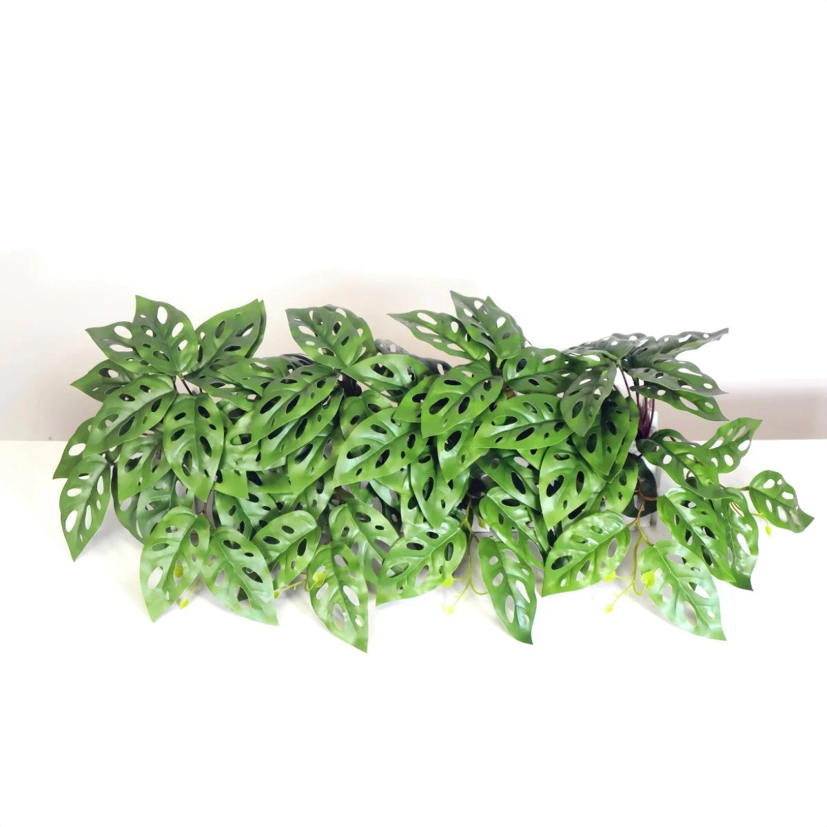 plantes artificielles vertes feuilles perforées modernes décoration intérieure pot tropical