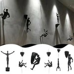 statues escalade homme résine noires texture rugueuse détail anatomique réaliste fixées