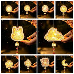 lampe suspendue artisanale or blanc rouge ornements floraux motifs géométriques cloche pompon anniversaire noël