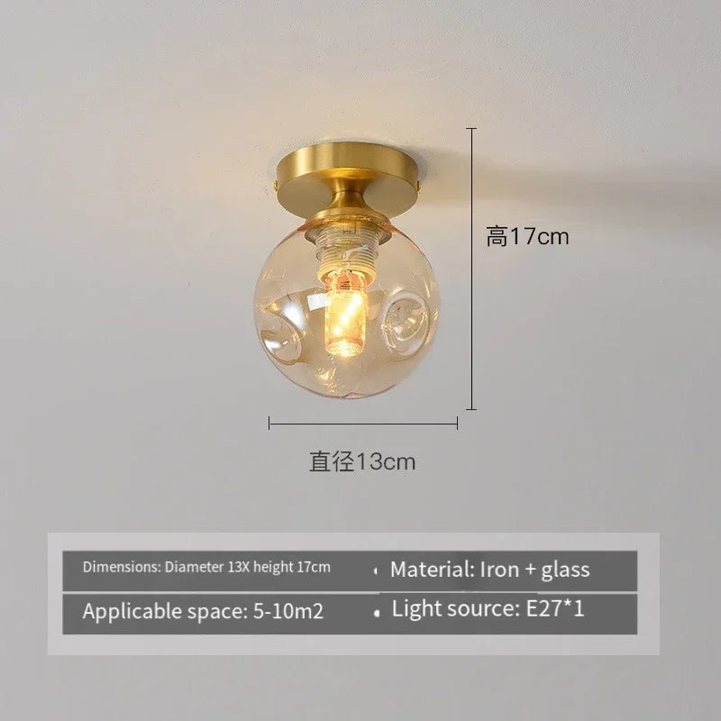 lampe moderne verre transparent noir doré élégante sphérique éclairage contemporain
