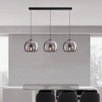 suspension pendentif noir transparent moderne têtes ambrées têtes noires flux lumineux 249 2000 autonome