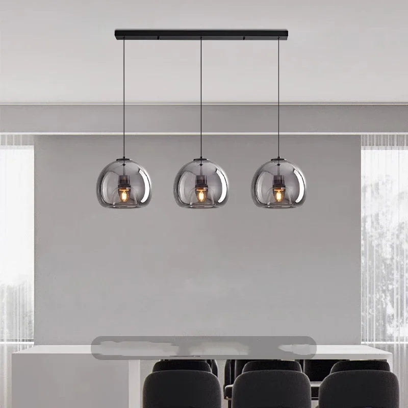 suspension pendentif noir transparent moderne têtes ambrées têtes noires flux lumineux 249 2000 autonome