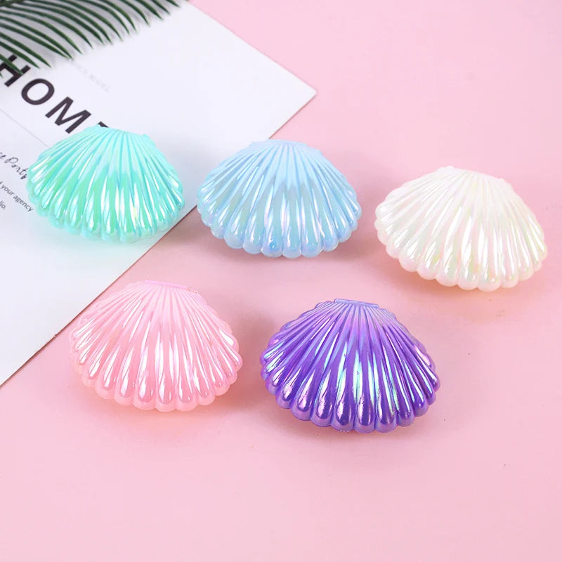 boîtes dragées forme coquillage violet vert rose blanc rayures horizontales moderne festives anniversaire dragées