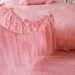 Parure de lit luxe rose pour chambre romantique