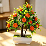 décoration intérieure arbre artificiel bonsaï pot blanc feuilles vertes fruits rouges tronc brun