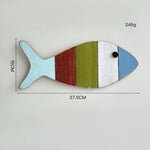 décoration murale poissons bois couleurs vives artisanal thème océan vintage