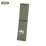 coussin pliable plein air camping noir vert olive imprimé logo blanc texture tissée pratique