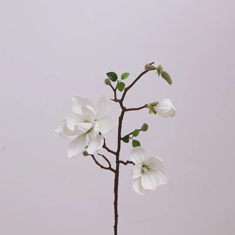 décoration intérieure branche magnolia artificielle fleurs rose blanches naturel salon maison événements