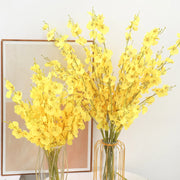 bouquet fleurs artificielles jaune vif modernes décoration intérieure vase transparent salon chambre