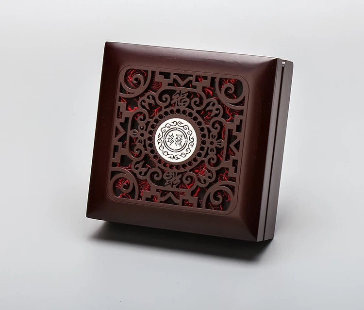 boîtes bois marron foncé boîte bijoux décoration intérieure boutons métalliques ajourés respectueux environnement classique