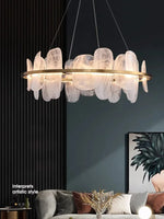 suspension lumineuse contemporaine élégante blanc doré texture organique ondulée translucent câbles suspension