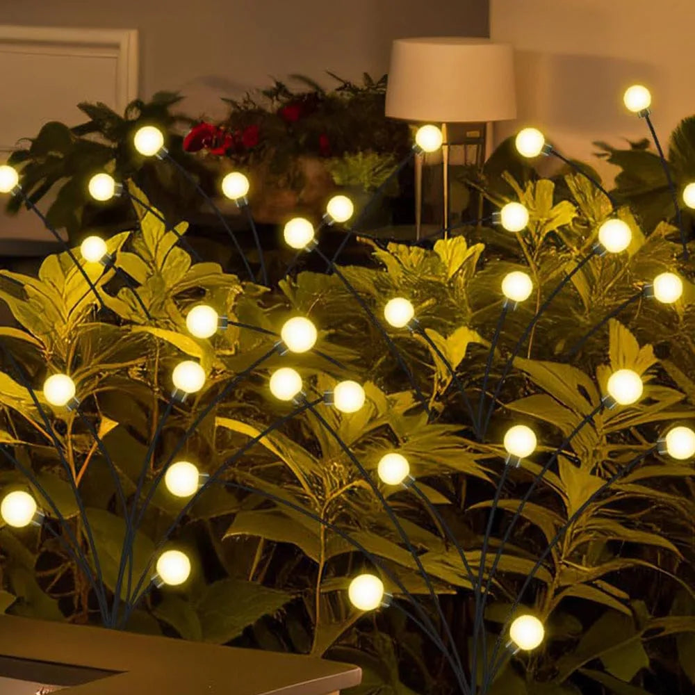 décoration extérieure jardin guirlande lumineuse solaire led feux foyers contemporaine